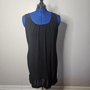 White House Black Market black sleeveless cocktail party dress with silk trim.